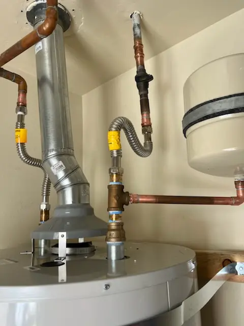 Water heater installation and plumbing repair in Home Gardens